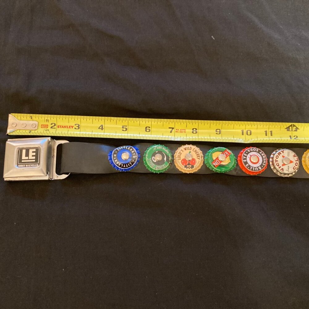 Vintage seat belt bottle cap belt